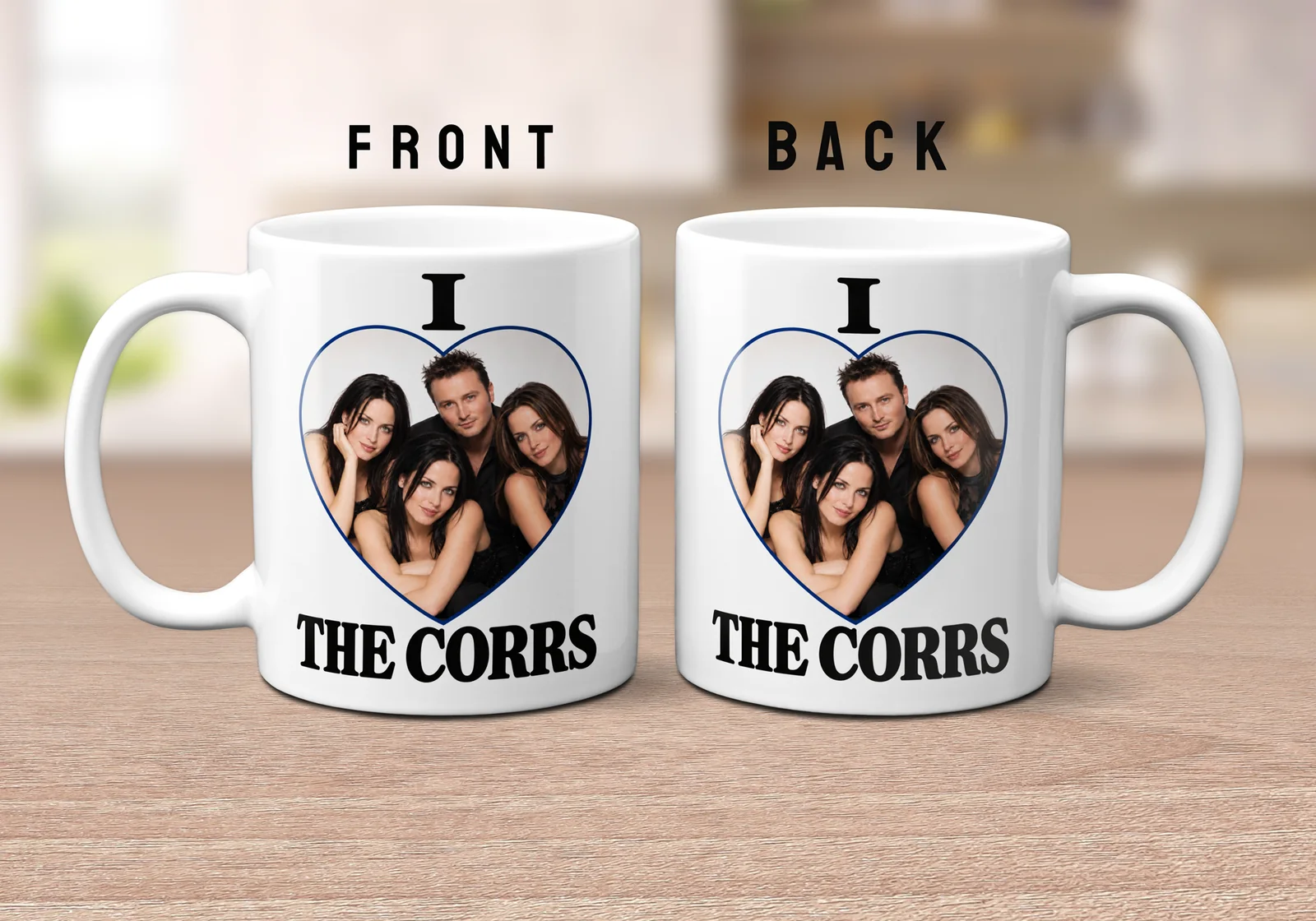 An 11oz ceramic mug featuring a fixed design with bold black text reading I Love THE CORRS and a heart-shaped group image insert.
