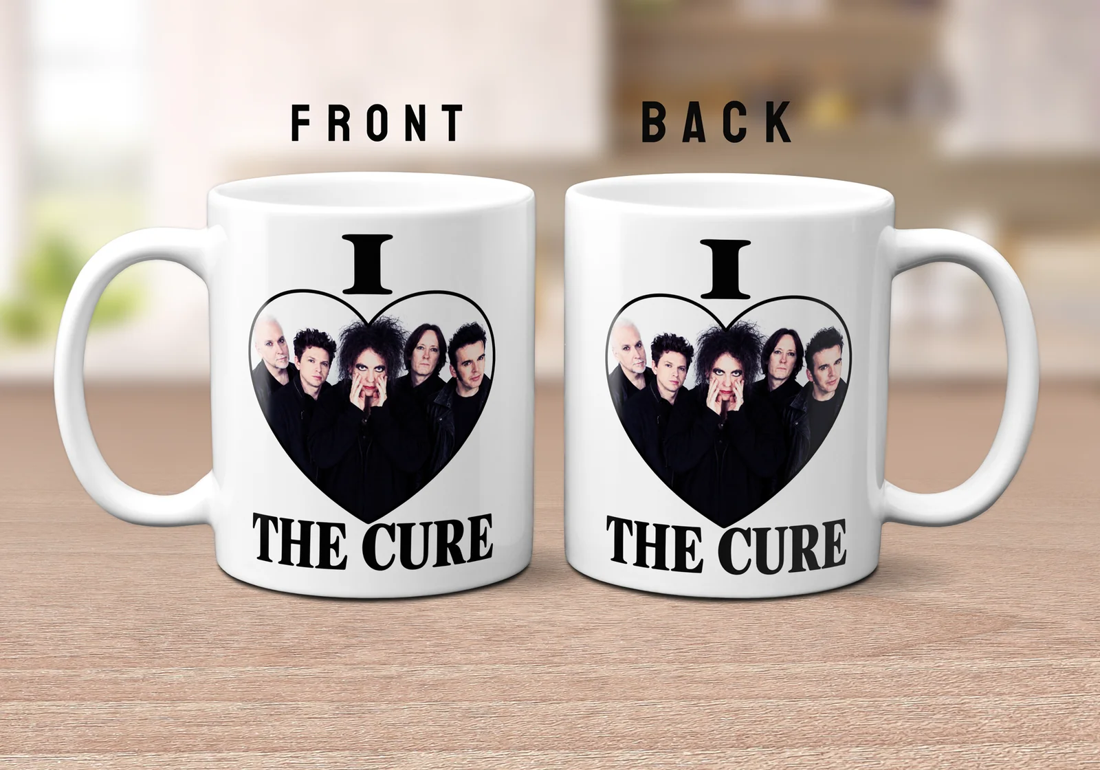 White ceramic mug with black print reading I Love THE CURE featuring a heart outline containing a photo of the band members.